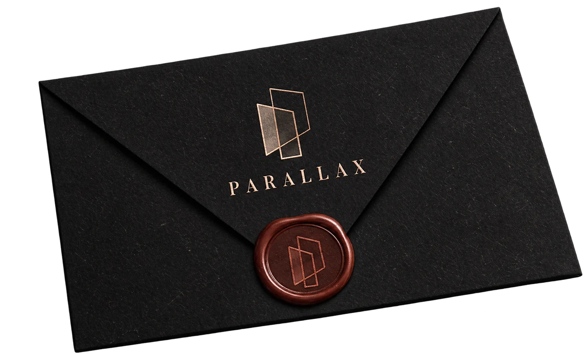 Envelope preto lacrado com o selo de cera da Parallax